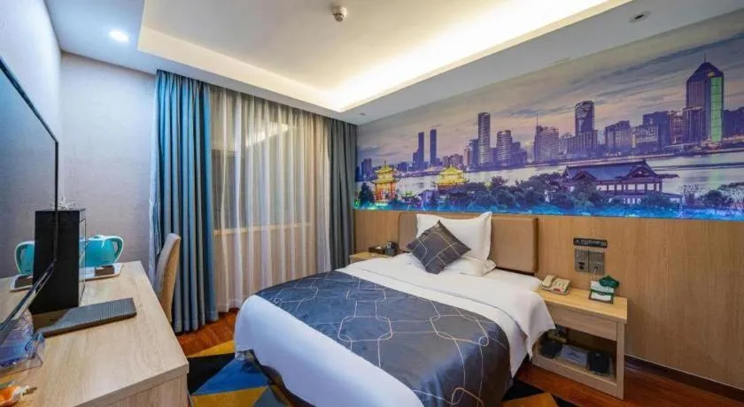 Bed in Chonpines Hotel Shenzhen Gongming Honghuashan Metro Station