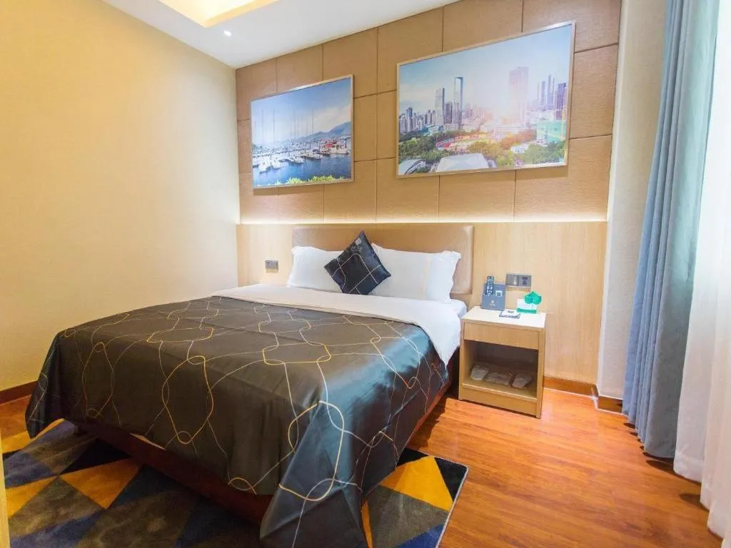 Bed in Chonpines Hotel Shenzhen Gongming Honghuashan Metro Station