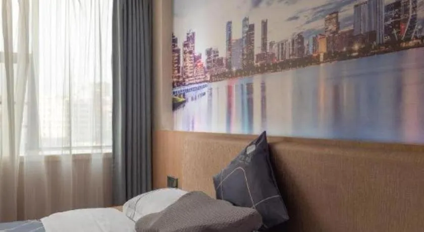 Bed in Chonpines Hotel Shenzhen Gongming Honghuashan Metro Station