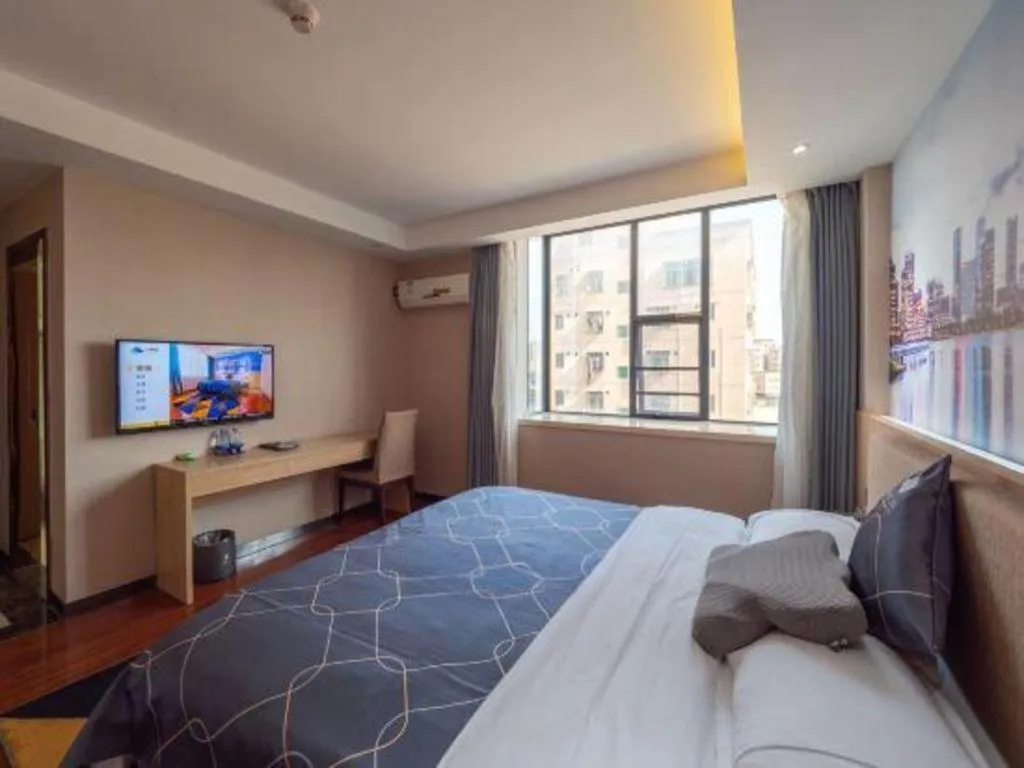 Bed in Chonpines Hotel Shenzhen Gongming Honghuashan Metro Station