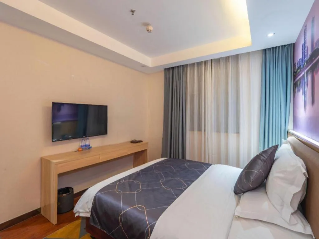 Bed in Chonpines Hotel Shenzhen Gongming Honghuashan Metro Station
