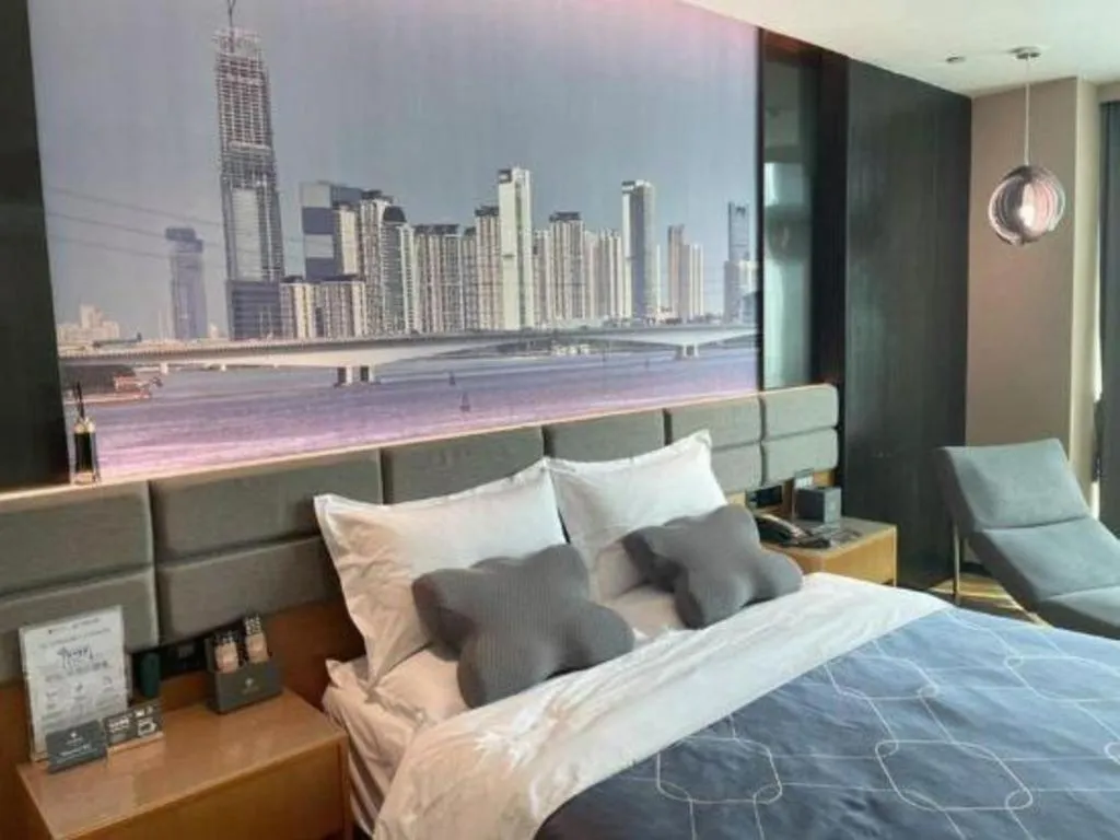 Bed in Chonpines Hotel Guangzhou Sunac Cultural and Tourism City Shiling