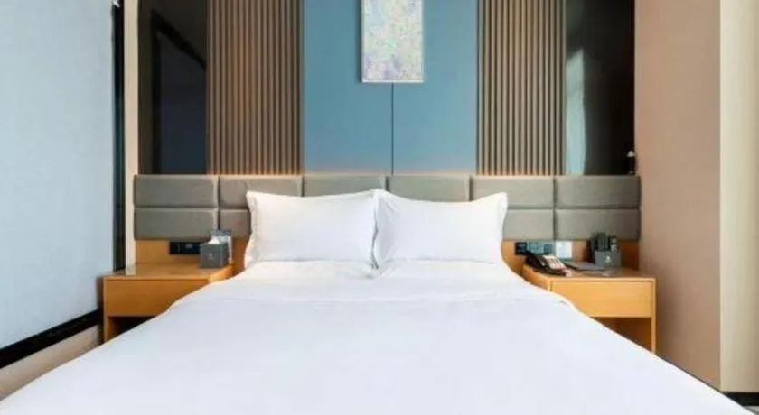 Bed in Chonpines Hotel Guangzhou Sunac Cultural and Tourism City Shiling