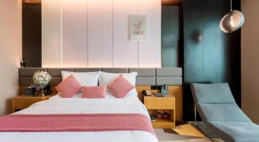 Bed in Chonpines Hotel Guangzhou Sunac Cultural and Tourism City Shiling