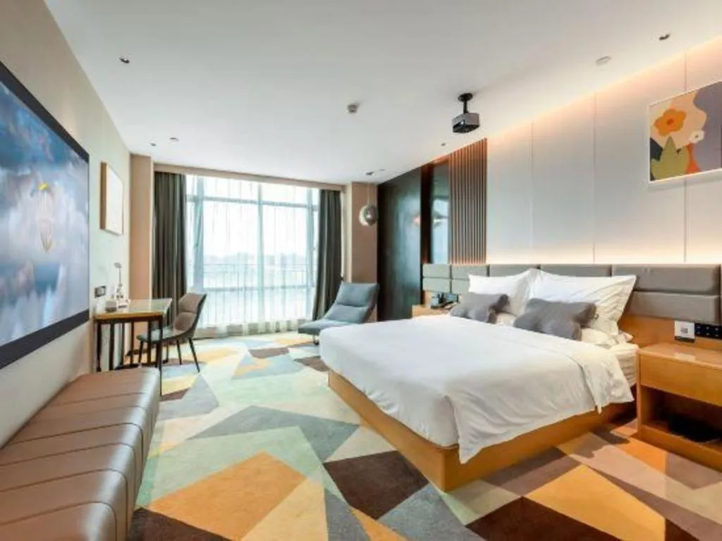 Bed in Chonpines Hotel Guangzhou Sunac Cultural and Tourism City Shiling