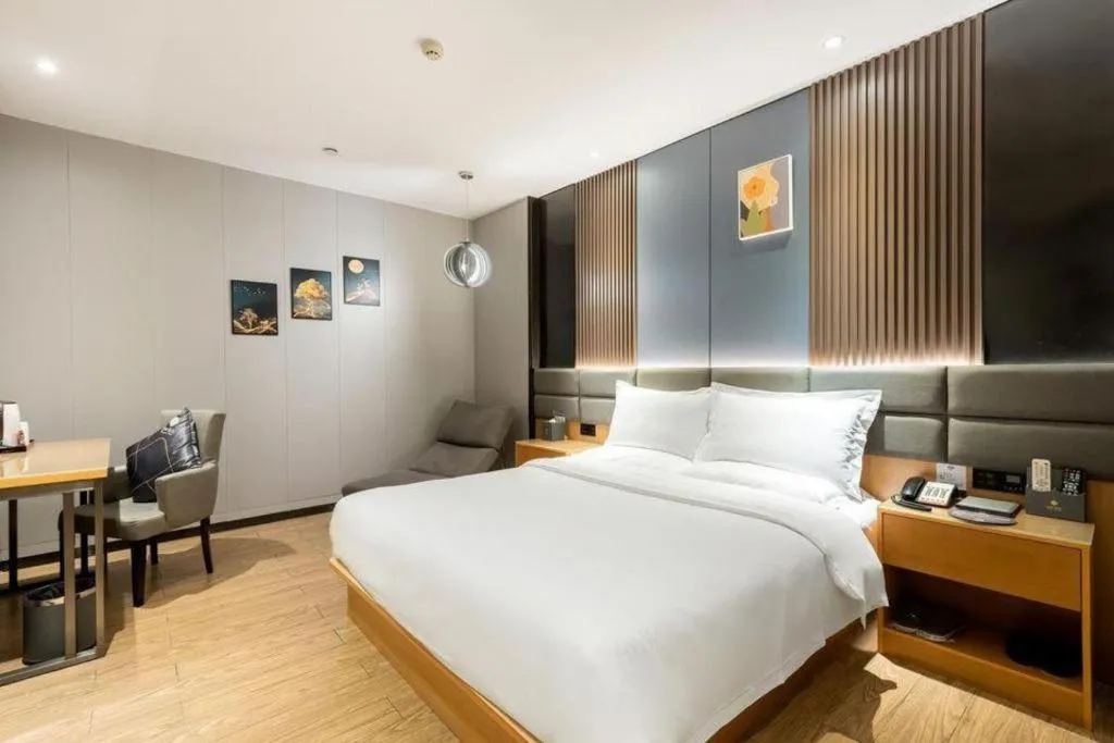 Bed in Chonpines Hotel Guangzhou Sunac Cultural and Tourism City Shiling