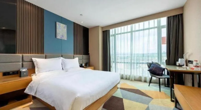 Bed in Chonpines Hotel Guangzhou Sunac Cultural and Tourism City Shiling