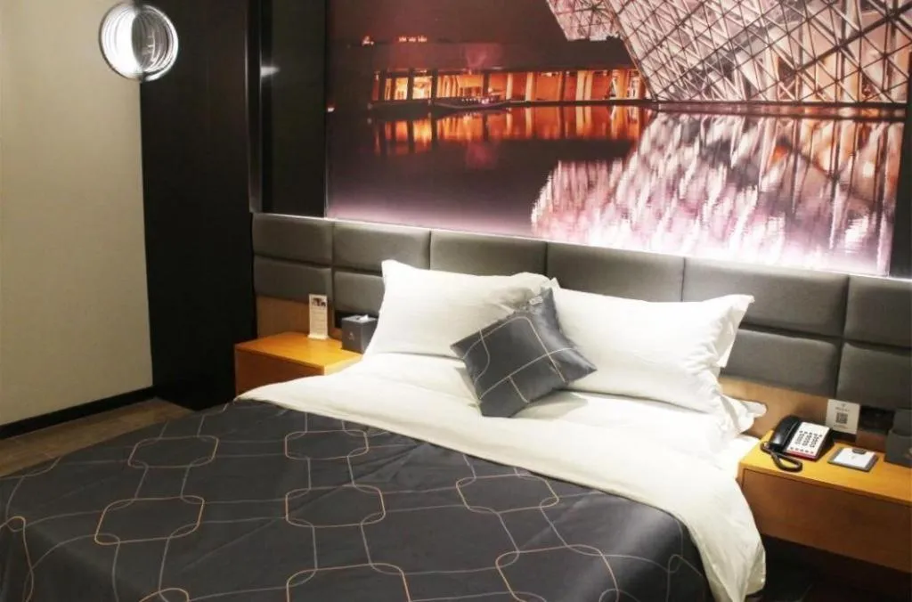 Bed in Chonpines Hotel Guangzhou Sunac Cultural and Tourism City Shiling