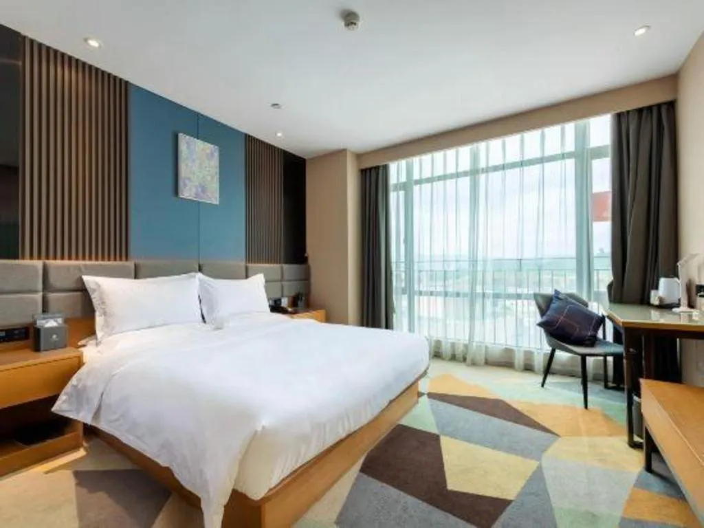 Bed in Chonpines Hotel Guangzhou Sunac Cultural and Tourism City Shiling