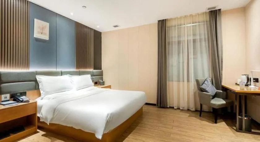 Bed in Chonpines Hotel Guangzhou Sunac Cultural and Tourism City Shiling