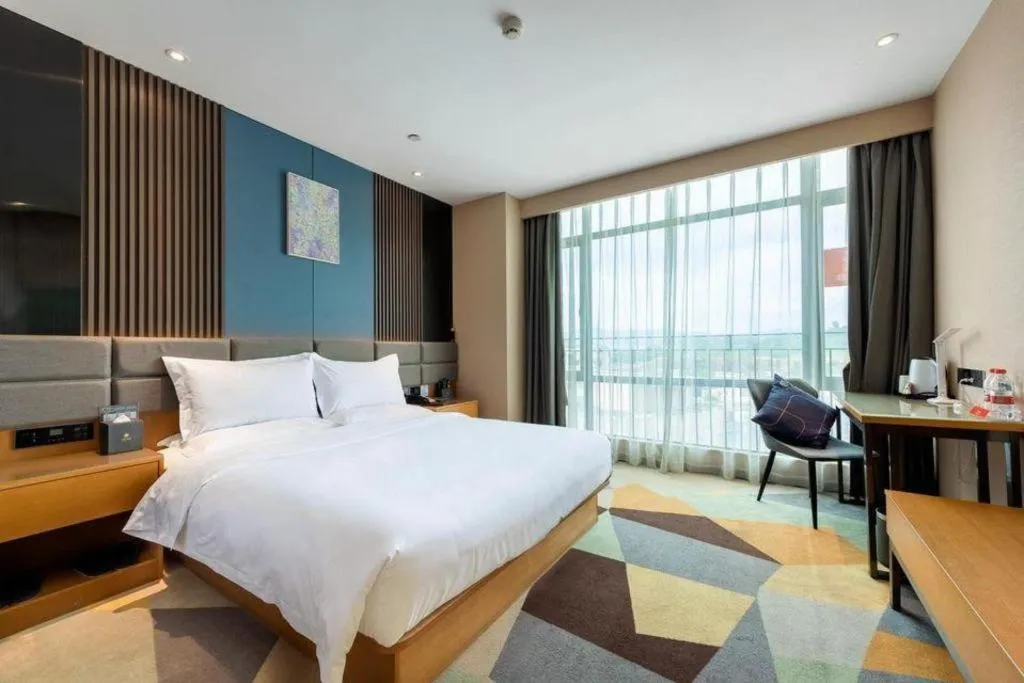 Bed in Chonpines Hotel Guangzhou Sunac Cultural and Tourism City Shiling