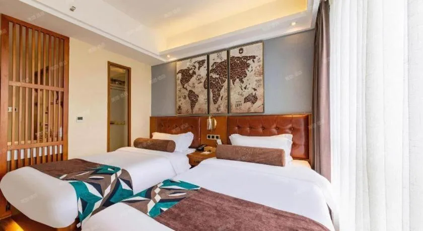 Bed in James Joyce Coffetel Guangyuan High-Speed Railway Station Dongba Municipal Government