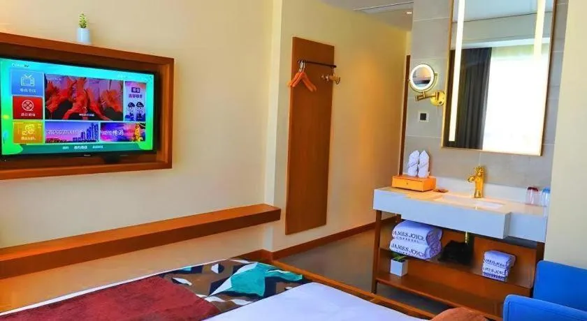 Bed in James Joyce Coffetel Guangyuan High-Speed Railway Station Dongba Municipal Government