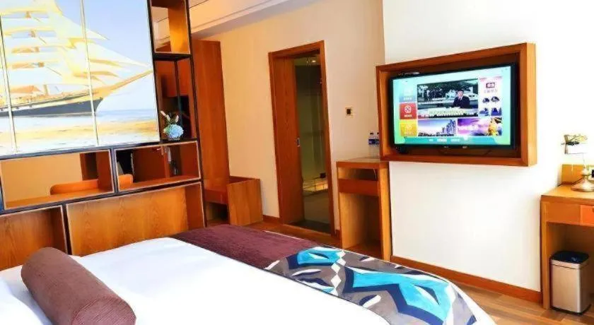 Bed in James Joyce Coffetel Guangyuan High-Speed Railway Station Dongba Municipal Government