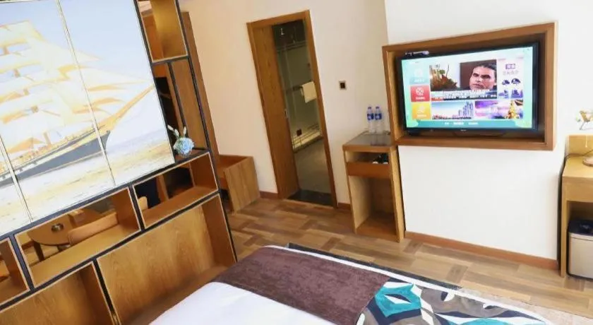 Bed in James Joyce Coffetel Guangyuan High-Speed Railway Station Dongba Municipal Government