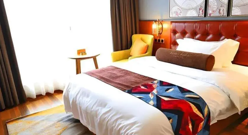 Bed in James Joyce Coffetel Guangyuan High-Speed Railway Station Dongba Municipal Government Bed in James Joyce Coffetel Guangyuan High-Speed Railway Station Dongba Municipal Government