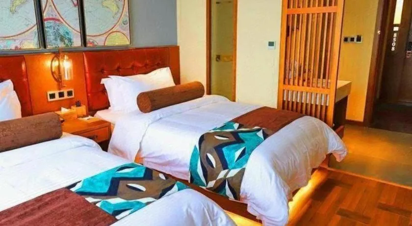 Bed in James Joyce Coffetel Guangyuan High-Speed Railway Station Dongba Municipal Government