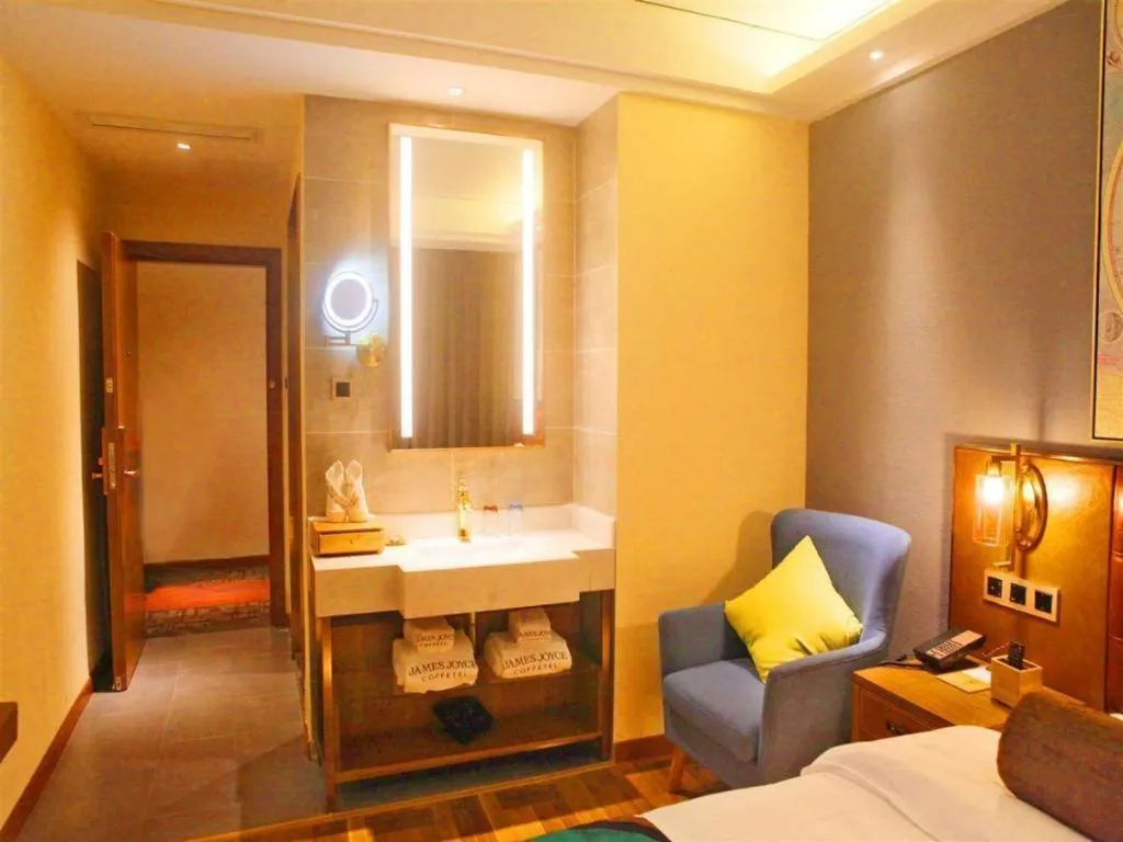 Bed in James Joyce Coffetel Guangyuan High-Speed Railway Station Dongba Municipal Government