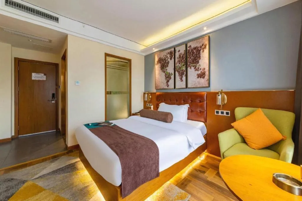 Bed in James Joyce Coffetel Guangyuan High-Speed Railway Station Dongba Municipal Government