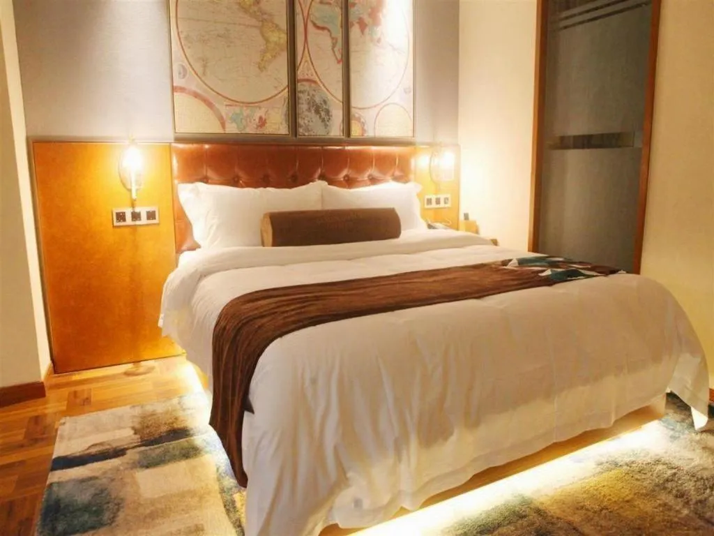 Bed in James Joyce Coffetel Guangyuan High-Speed Railway Station Dongba Municipal Government