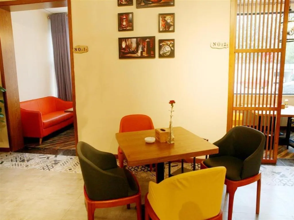 Bed in James Joyce Coffetel Guangyuan High-Speed Railway Station Dongba Municipal Government