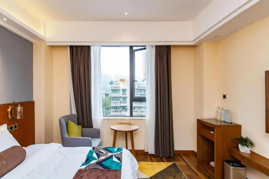 Bed in James Joyce Coffetel Guangyuan High-Speed Railway Station Dongba Municipal Government