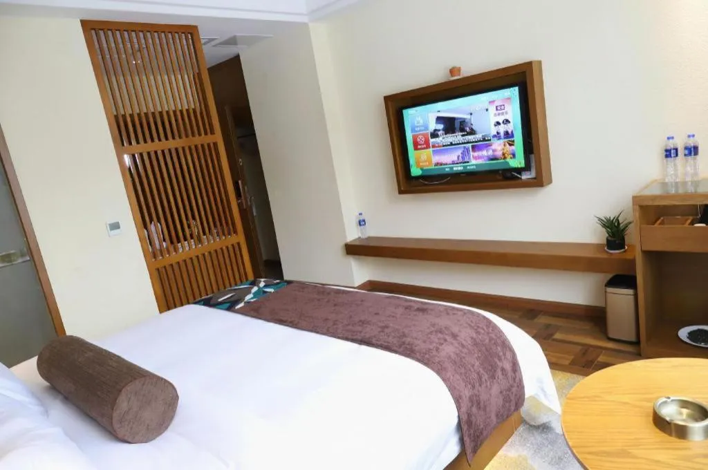 Bed in James Joyce Coffetel Guangyuan High-Speed Railway Station Dongba Municipal Government