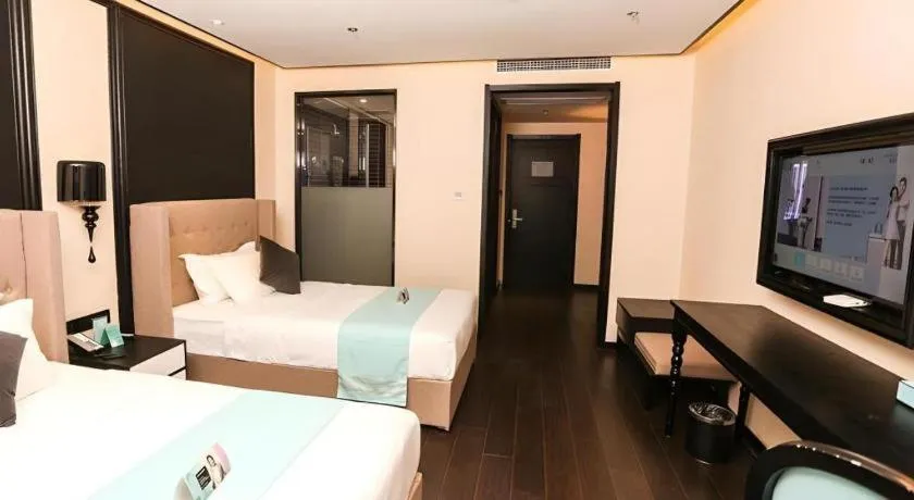 Bed in Xana Hotelle·Ji'nan Hi-tech Zone Century Avenue Tangye