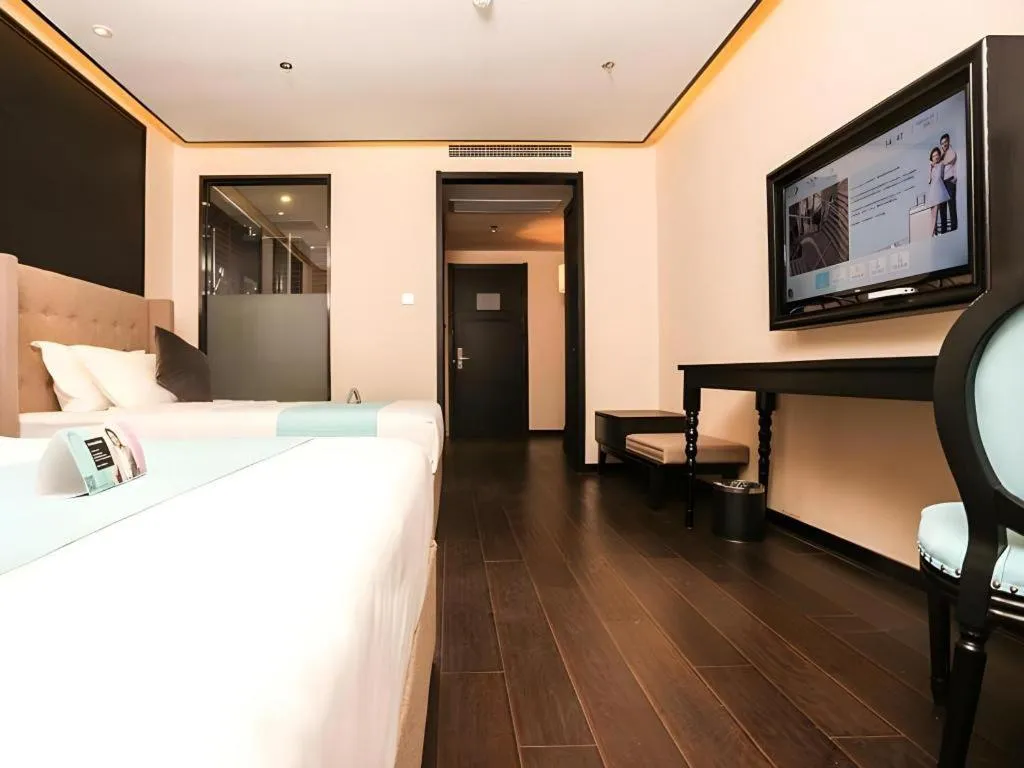 Bed in Xana Hotelle·Ji'nan Hi-tech Zone Century Avenue Tangye