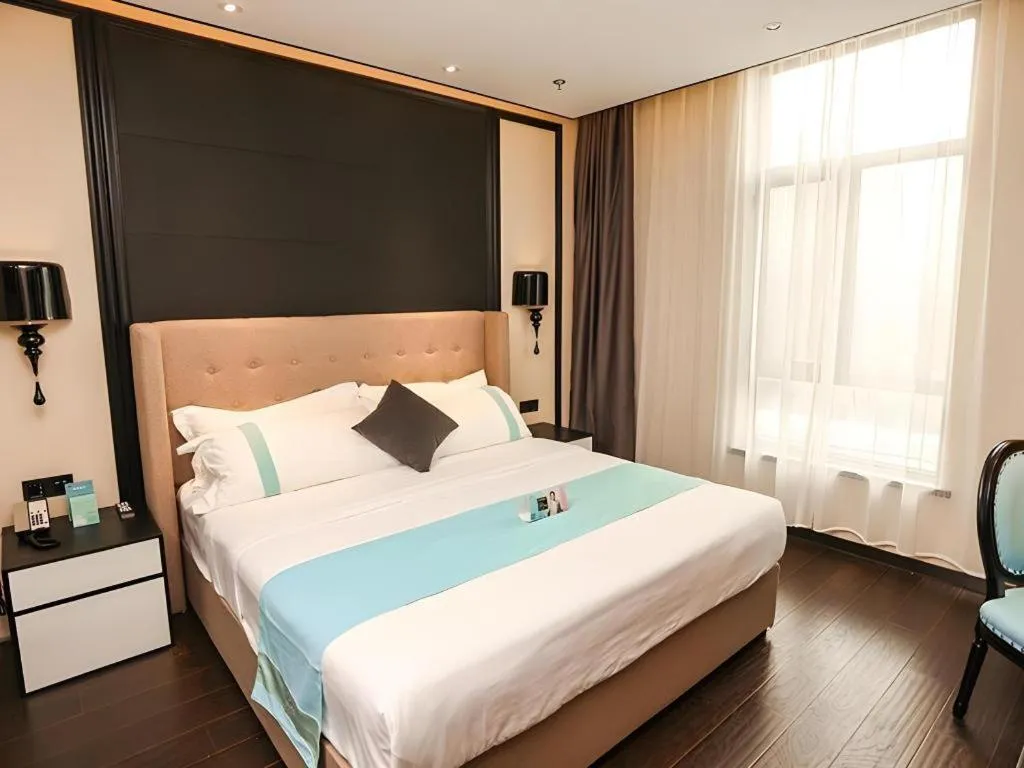 Bed in Xana Hotelle·Ji'nan Hi-tech Zone Century Avenue Tangye