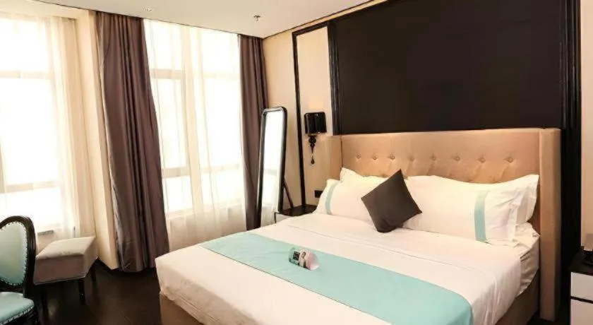 Bed in Xana Hotelle·Ji'nan Hi-tech Zone Century Avenue Tangye