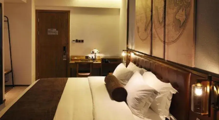 Bed in James Joyce Coffetel·Nannign Shanglin Tongle Road Bed in James Joyce Coffetel·Nannign Shanglin Tongle Road