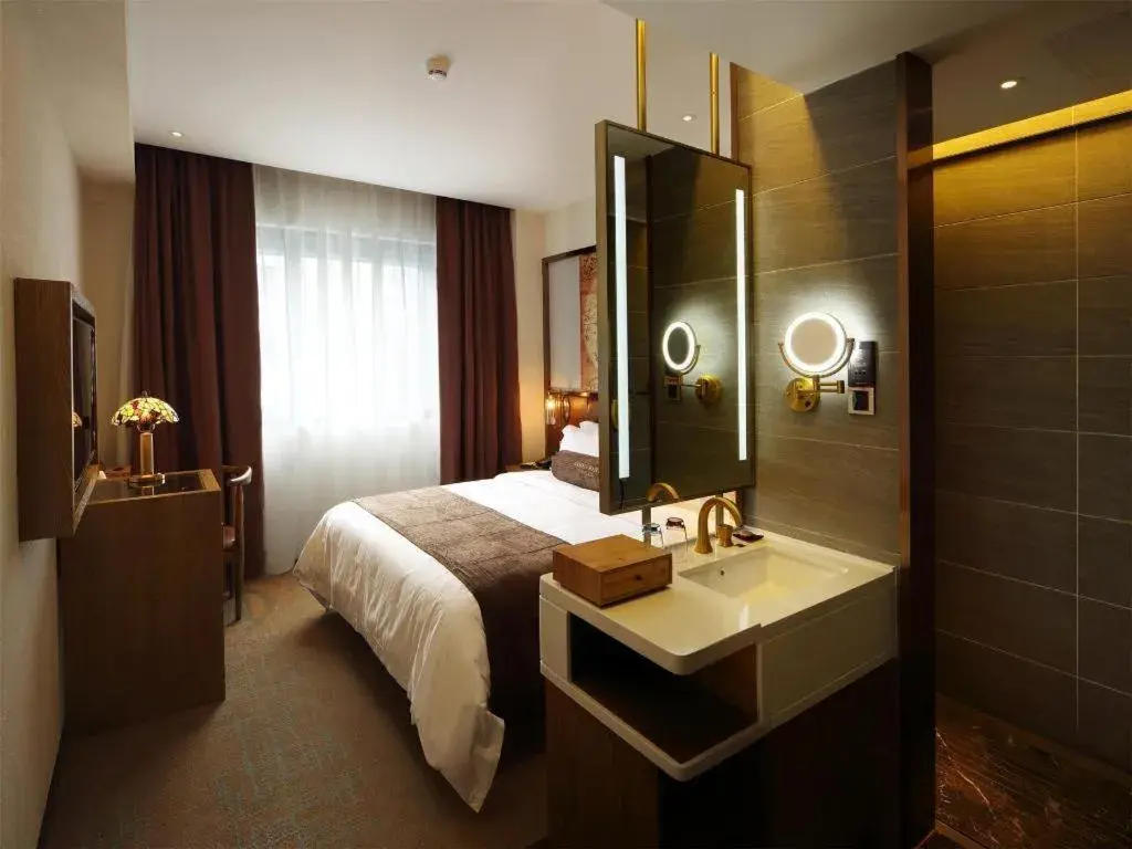 Bed in James Joyce Coffetel·Nannign Shanglin Tongle Road Bed in James Joyce Coffetel·Nannign Shanglin Tongle Road