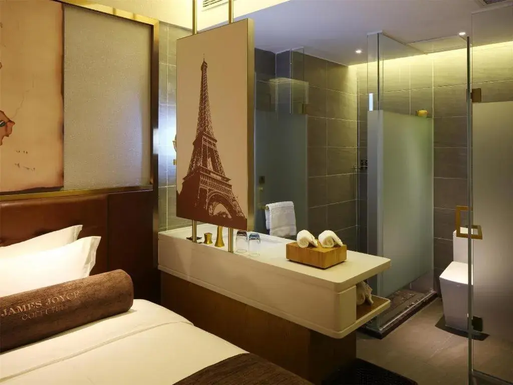 Bed in James Joyce Coffetel·Nannign Shanglin Tongle Road Bed in James Joyce Coffetel·Nannign Shanglin Tongle Road