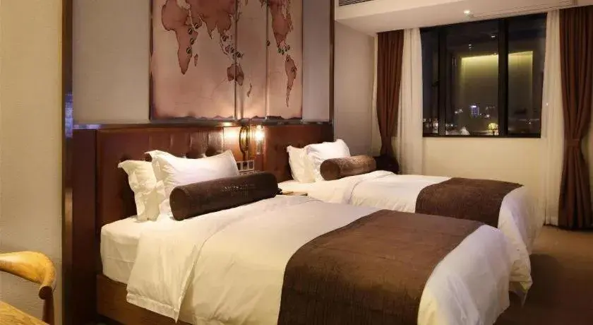 Bed in James Joyce Coffetel·Nannign Shanglin Tongle Road Bed in James Joyce Coffetel·Nannign Shanglin Tongle Road