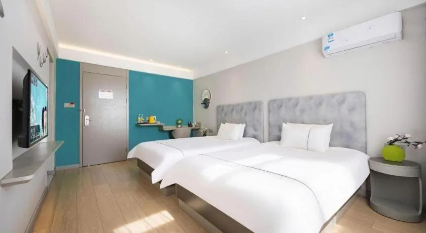 Bed in Magnotel Hotel Dandong Railway Yalv River