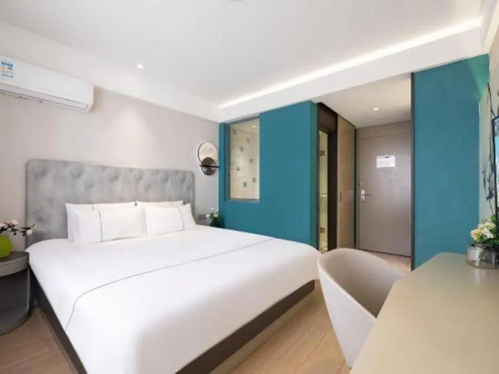 Bed in Magnotel Hotel Dandong Railway Yalv River