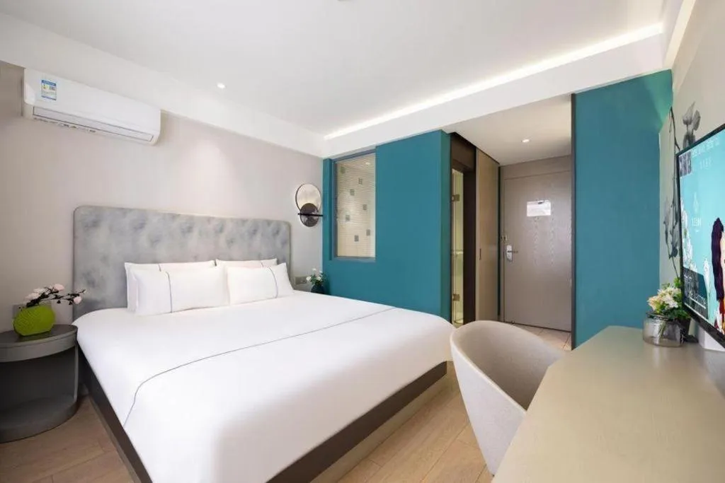 Bed in Magnotel Hotel Dandong Railway Yalv River