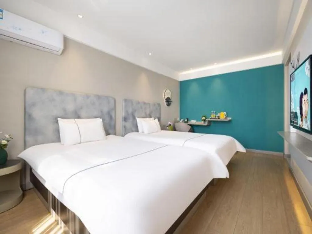 Bed in Magnotel Hotel Dandong Railway Yalv River