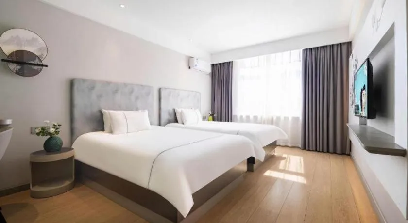 Bed in Magnotel Hotel Dandong Railway Yalv River