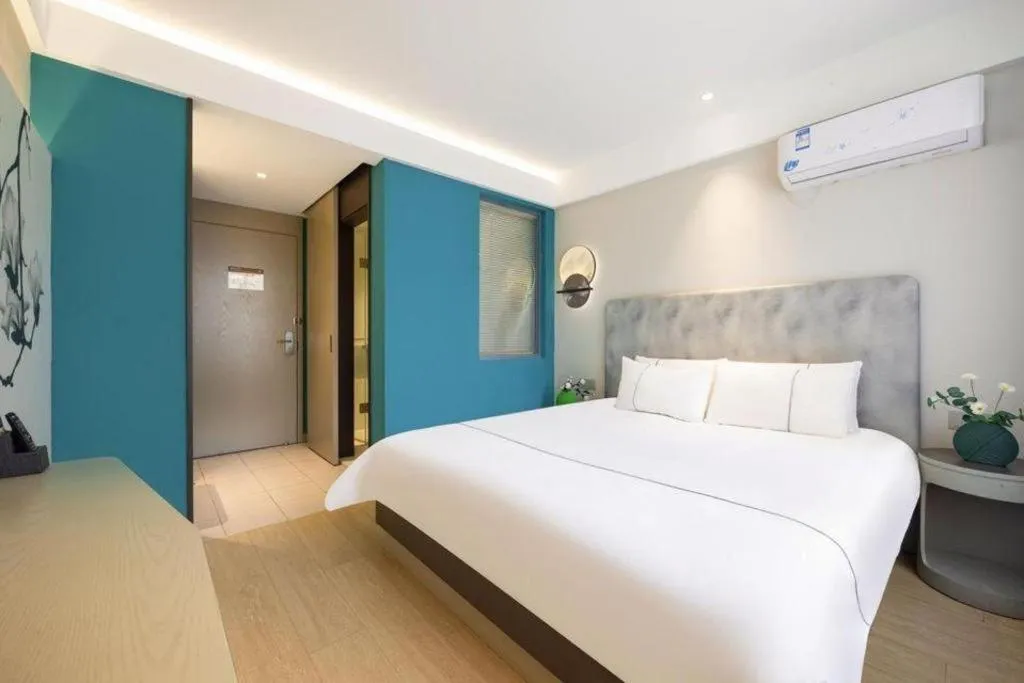 Bed in Magnotel Hotel Dandong Railway Yalv River