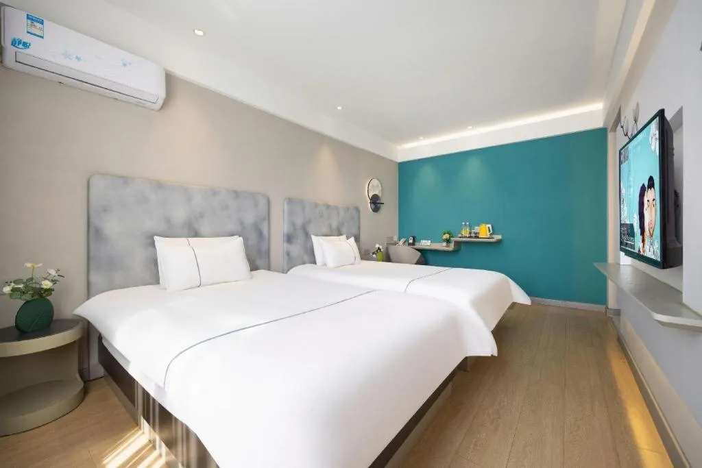 Bed in Magnotel Hotel Dandong Railway Yalv River