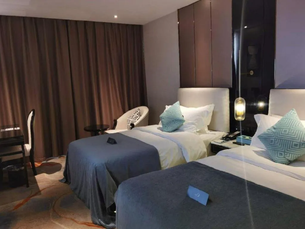 Bed in Xana Deluxe Beijing Guang'anmen Metro Station