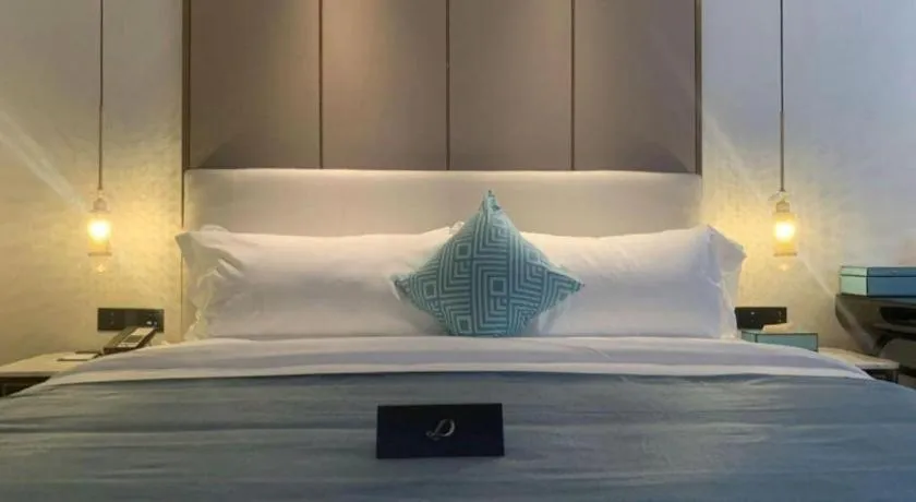 Bed in Xana Deluxe Beijing Guang'anmen Metro Station