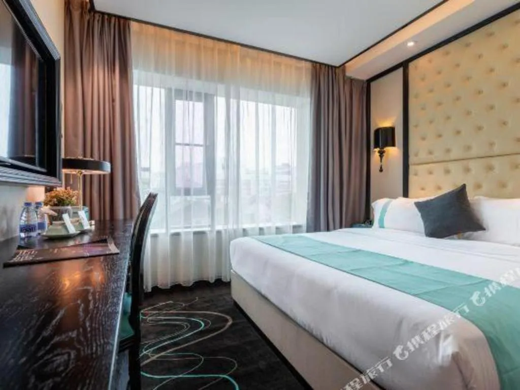 Bed in Xana Hotelle·Guangzhou Shangxiajiu Yongqingfang Changshou Road Metro Station