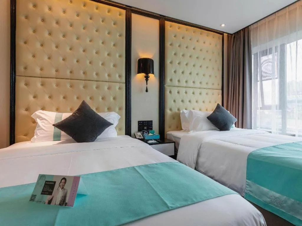 Bed in Xana Hotelle·Guangzhou Shangxiajiu Yongqingfang Changshou Road Metro Station