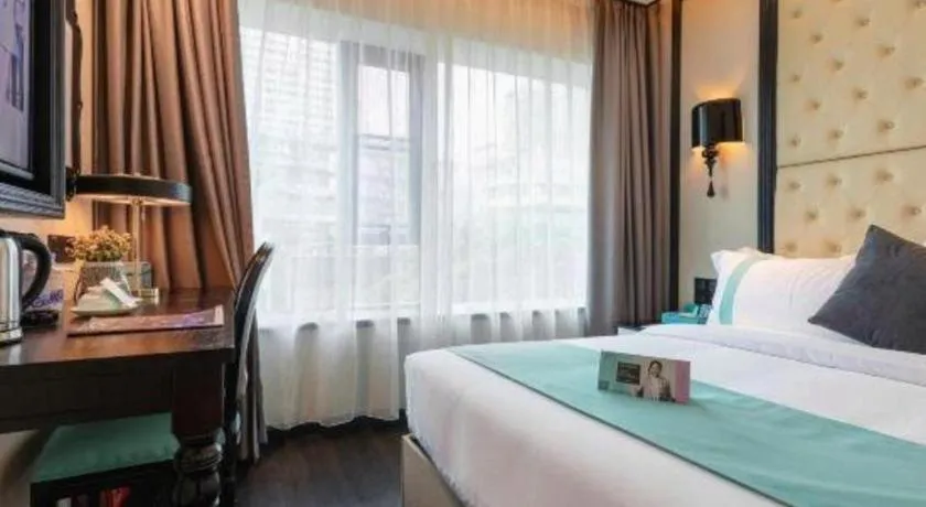 Bed in Xana Hotelle·Guangzhou Shangxiajiu Yongqingfang Changshou Road Metro Station