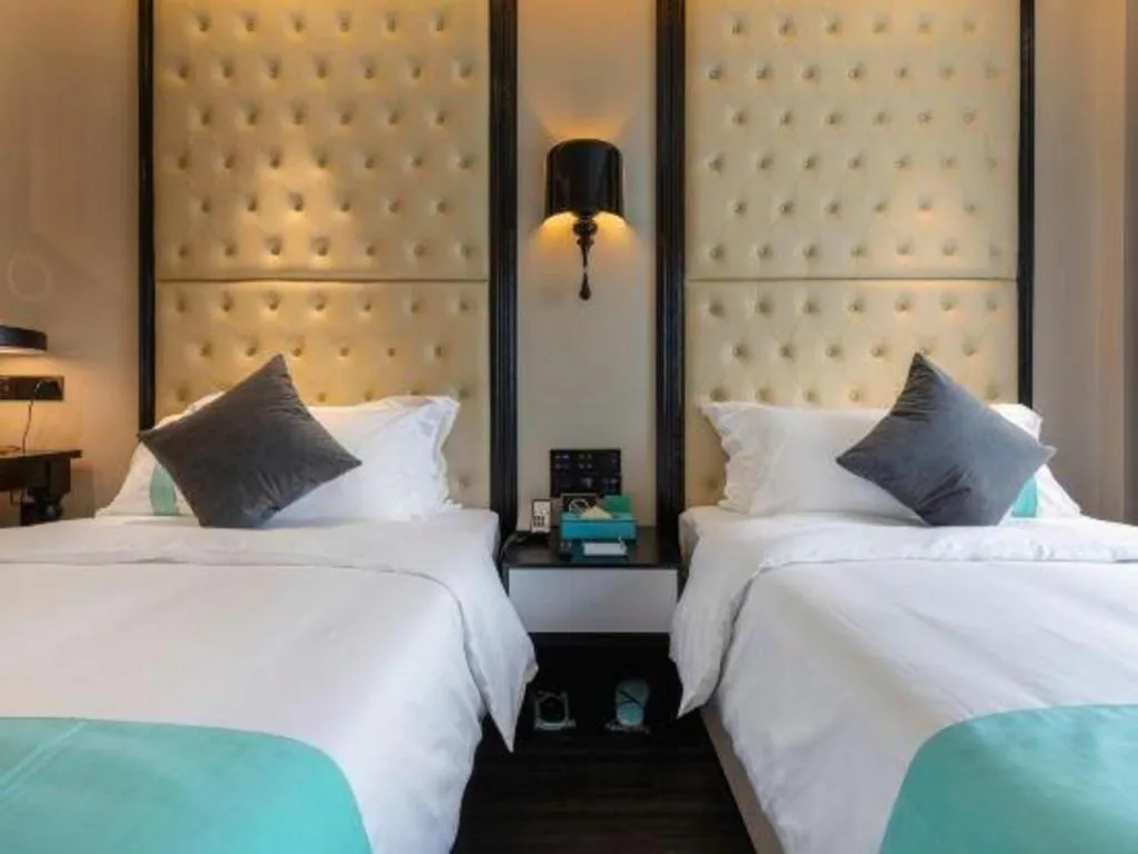 Bed in Xana Hotelle·Guangzhou Shangxiajiu Yongqingfang Changshou Road Metro Station