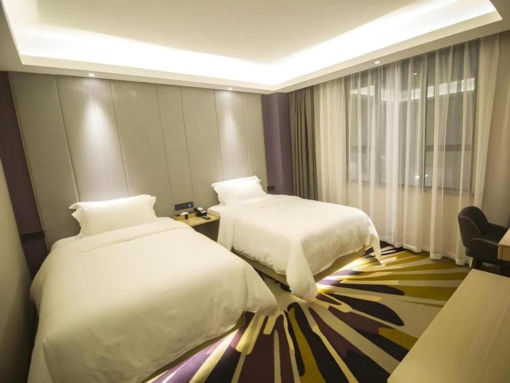 Bed in Lavande Hotel·Heyuan Bavaria