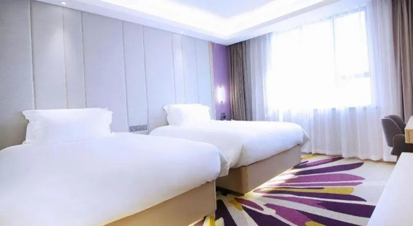 Bed in Lavande Hotel·Heyuan Bavaria